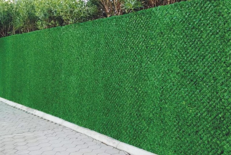 Cerca verde decorativa e seus benefícios