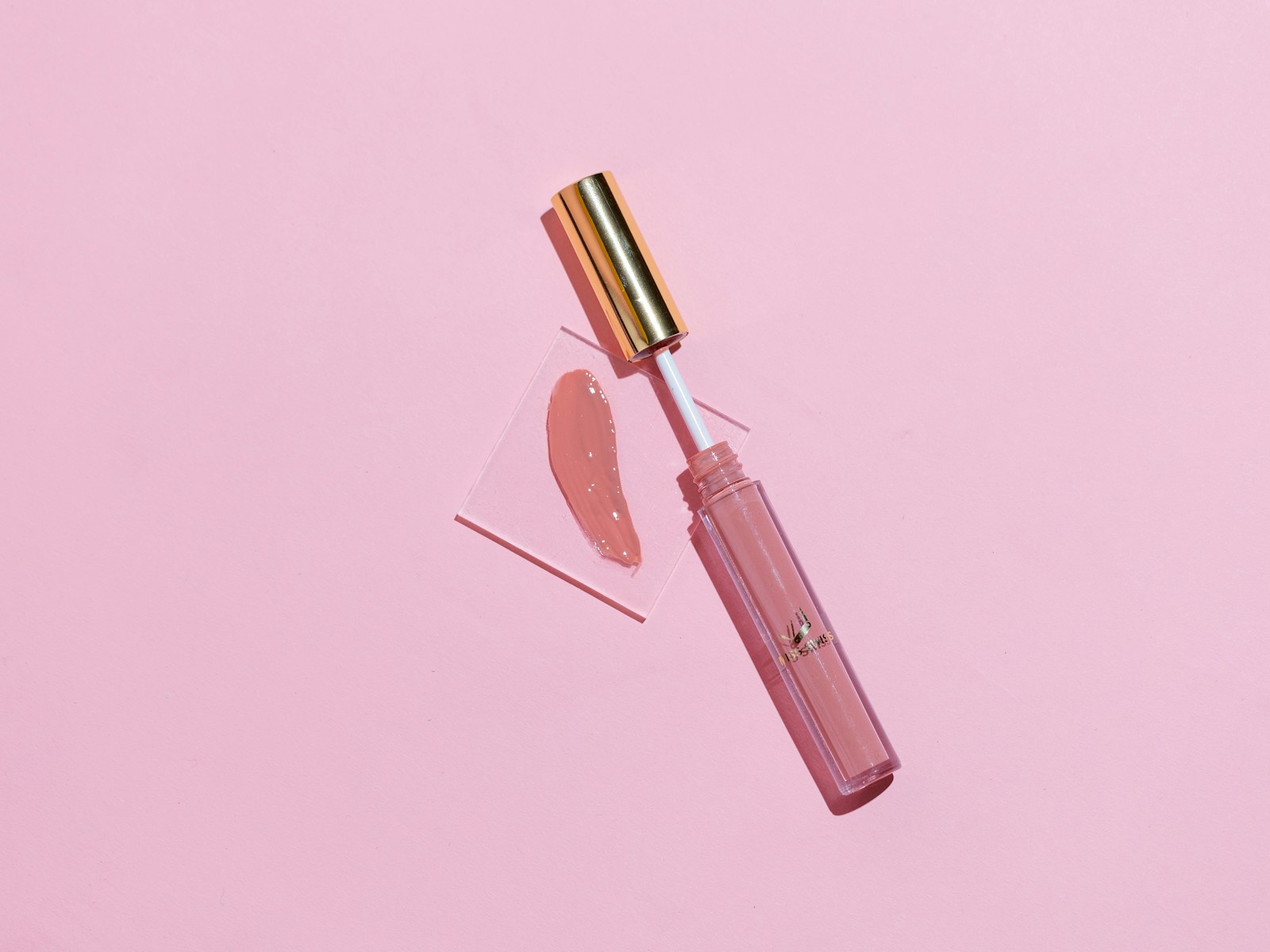 Lip gloss ingredients flatlay