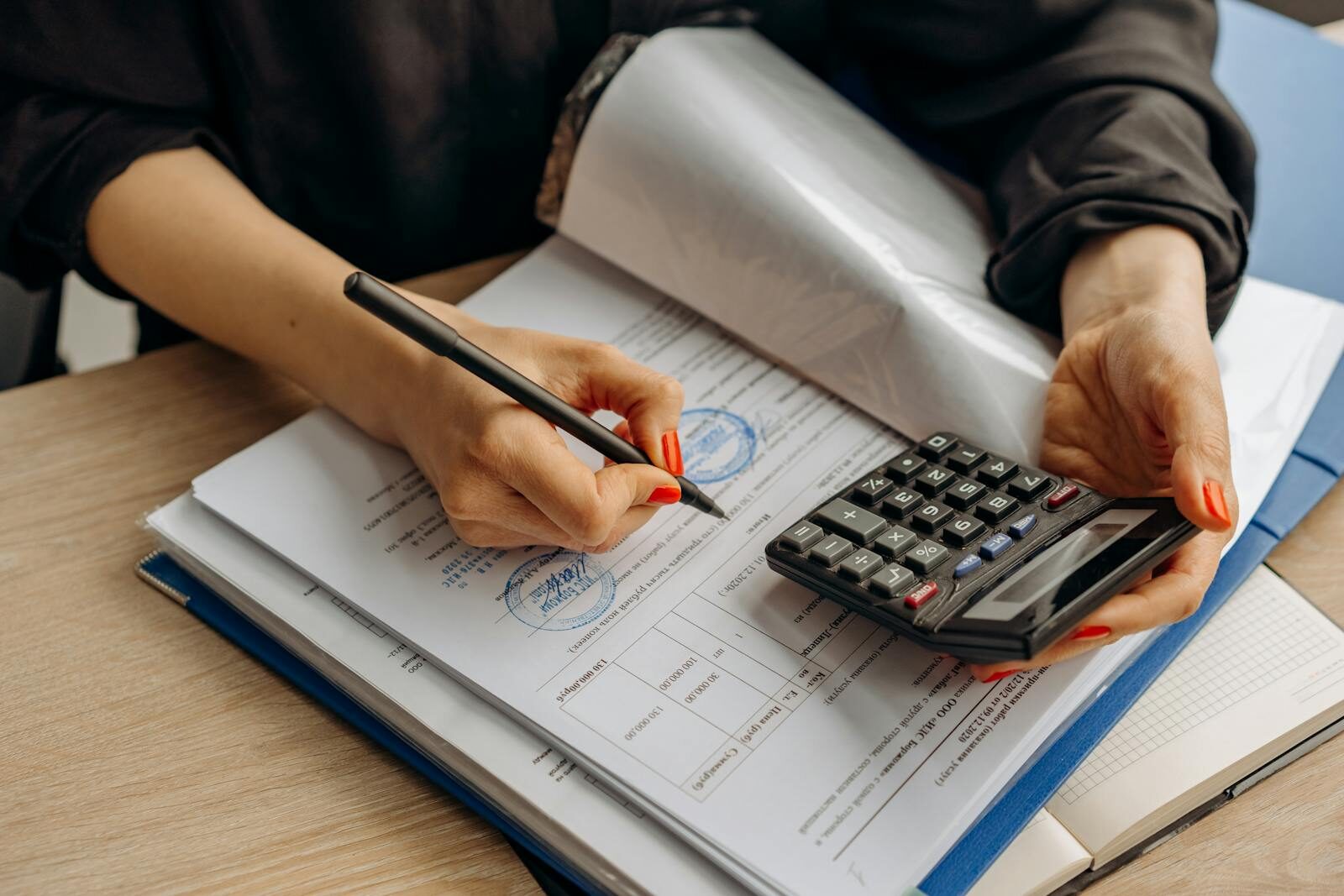 company analysis, financial check 📸📸 Realistic photo of a laptop showing financial reports and documents on desk, soft daylight, business environment Company analysis